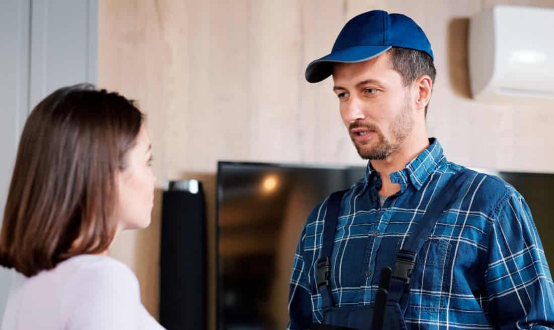 Modern air conditioner hanging on the wall in room. Cooling product for hot climate in summer. Machine which keeps the air in a building cool and dry. Modern interior with air-conditioning. 3D render. How to Prepare Your Home for a Smooth Air Conditioning Installation
